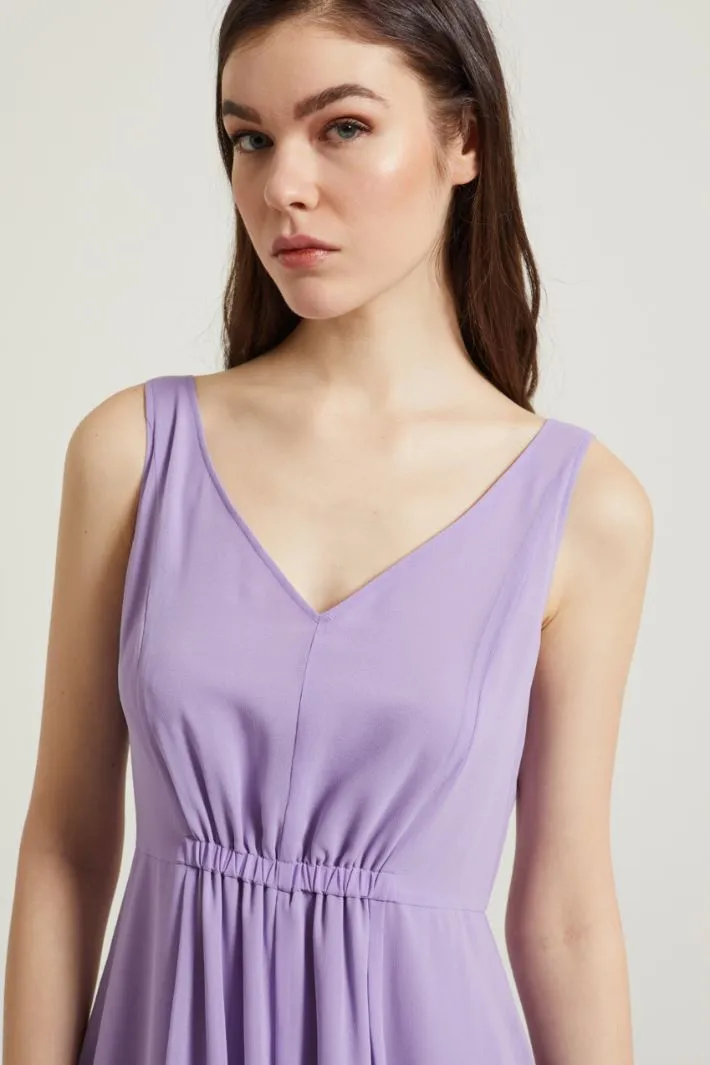Abito smanicato in georgette