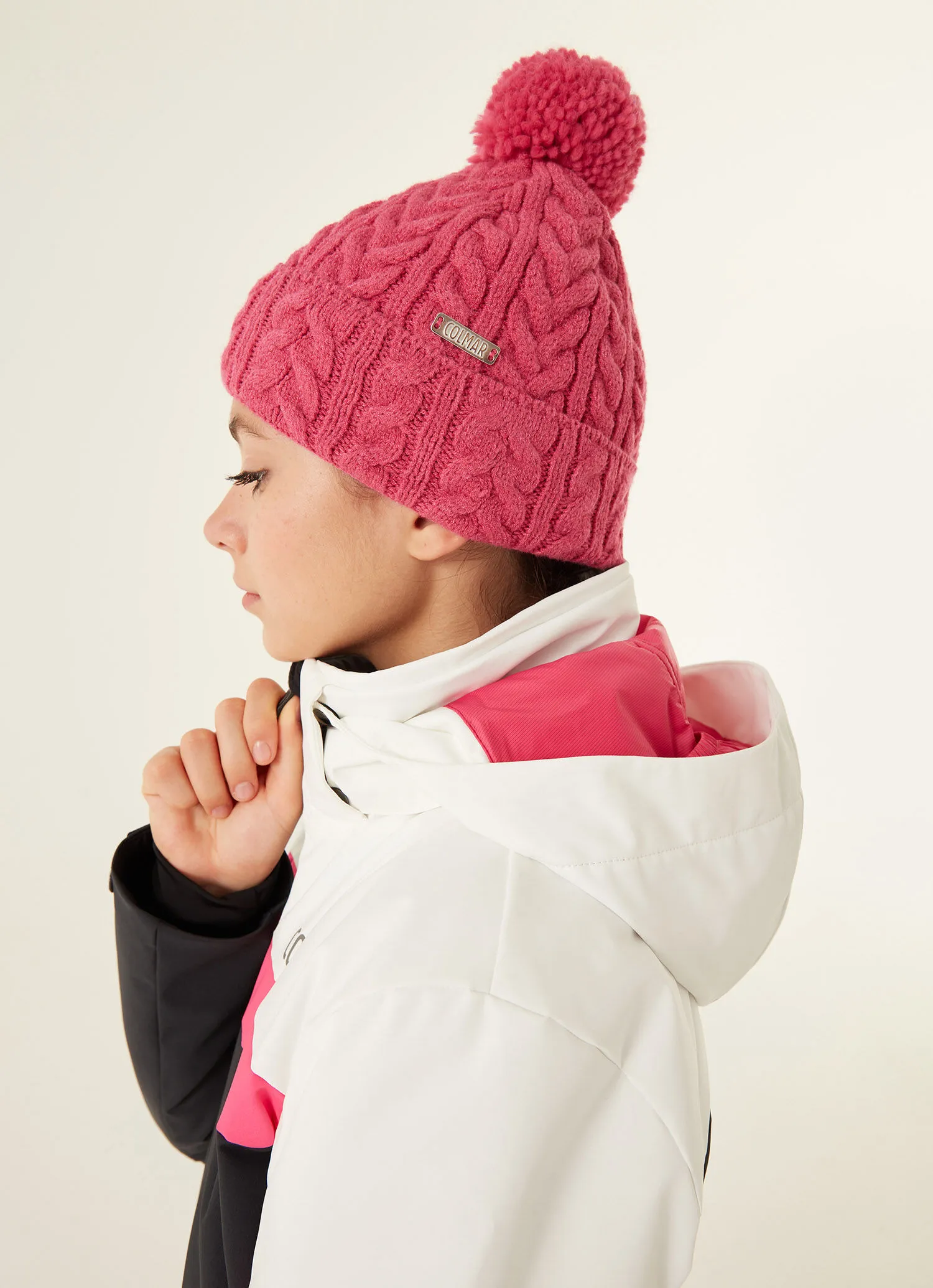 Braided girl's hat with pompom