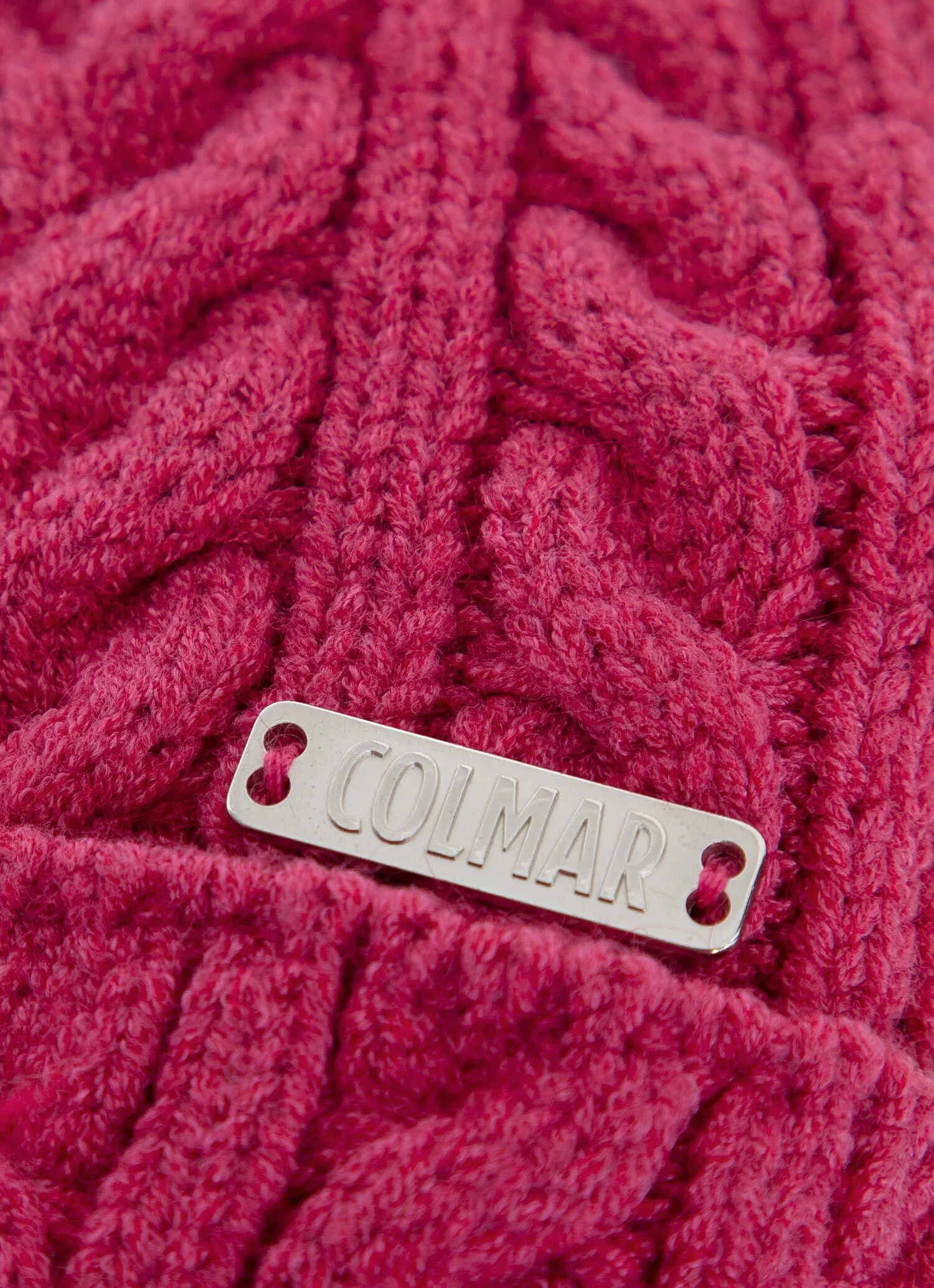 Braided girl's hat with pompom