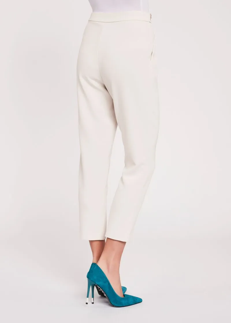 Pantaloni in crệpe con perle