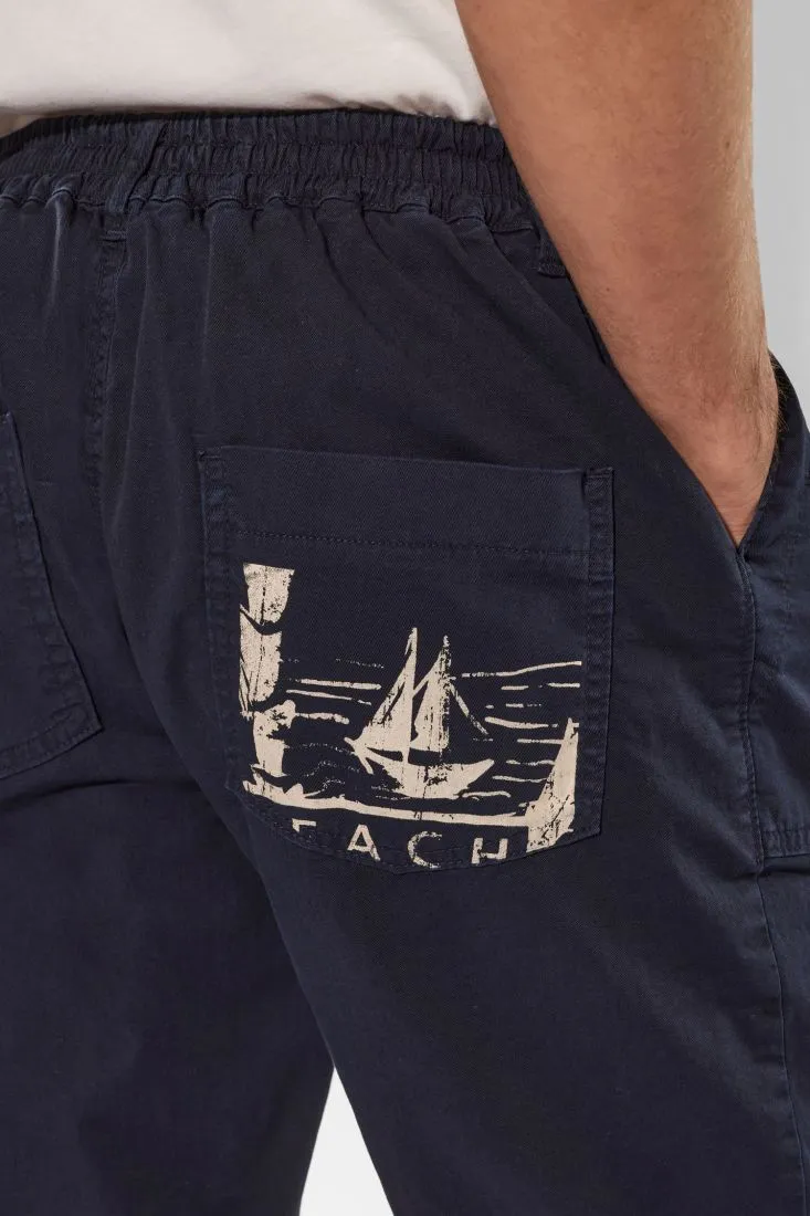 Pantaloni straight in puro cotone monocolour con pinces